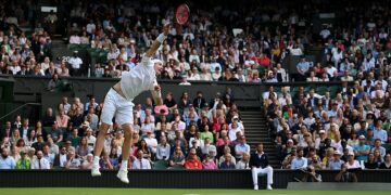 John Isner in air