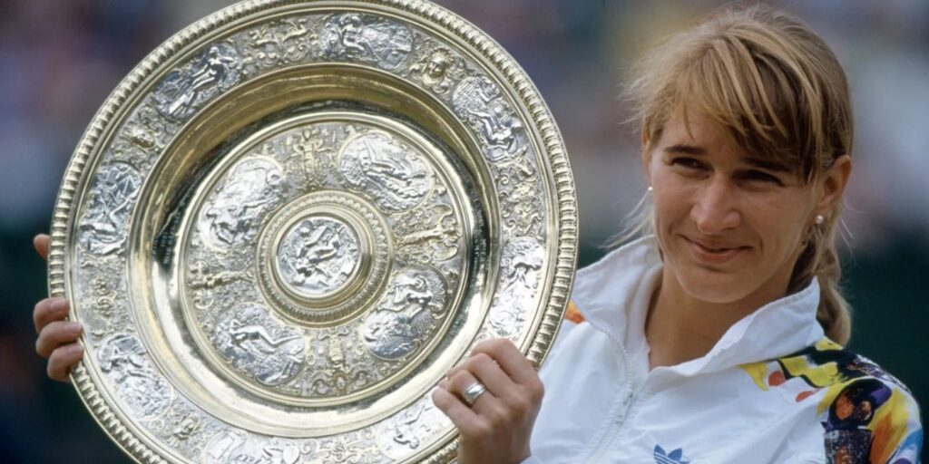 Steffi Graf with Wimbledon trophy